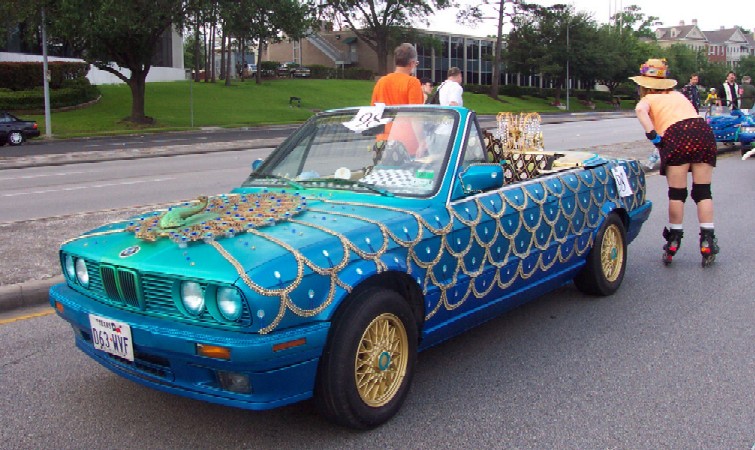 [img width=718 height=428 cacheid=000bf31d00226324feea32e51a0149296d]http://schade.spaceship.com/ArtCar2002/03_Peacock_BMW.jpg[/img]